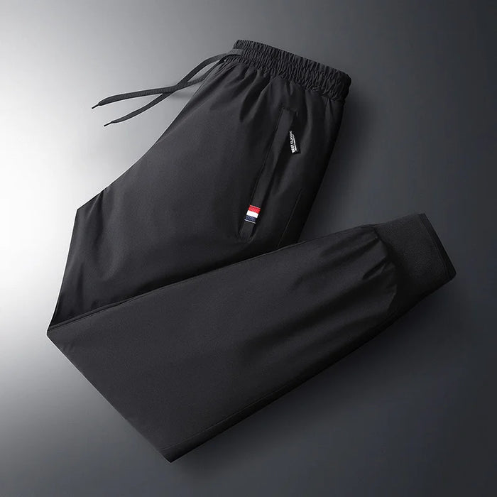 Autumn Pants Men's Elastic Waist Fitness Sportswear New Winter Waterproof and Warm Pants Men's Large Sized Loose Down Pants 7Xl